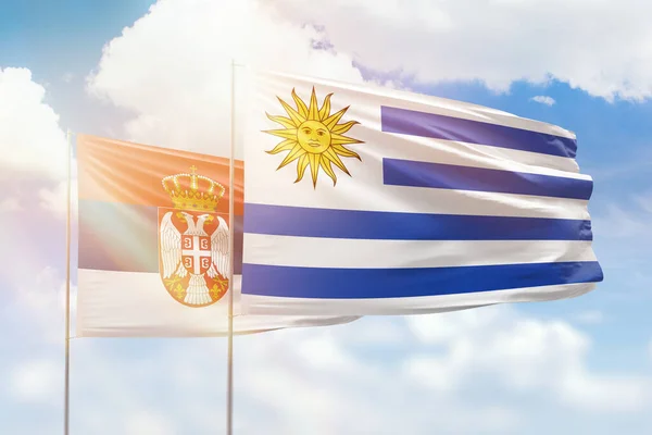 Sunny Blue Sky Flags Uruguay Serbia — Stockfoto