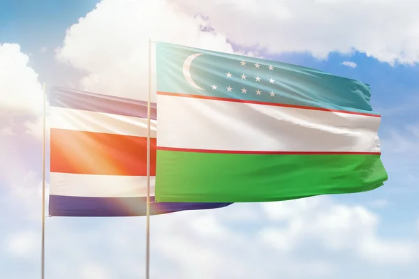 Sunny Blue Sky Flags Uzbekistan Costa Rica — Stock fotografie