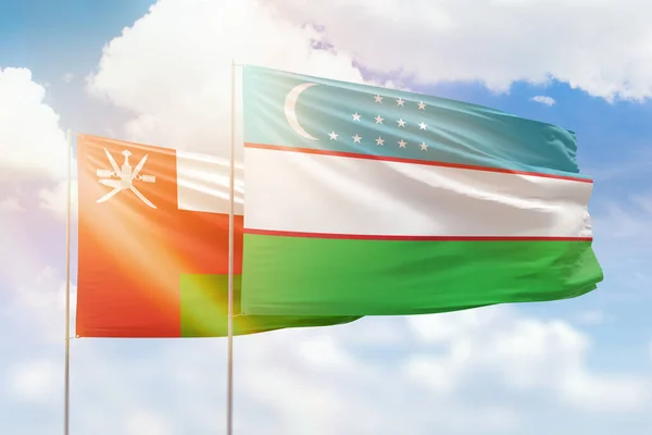 Sunny Blue Sky Flags Uzbekistan Oman — Stock Photo, Image