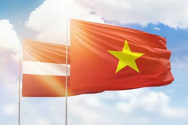 Sunny Blue Sky Flags Vietnam Latvia — Zdjęcie stockowe