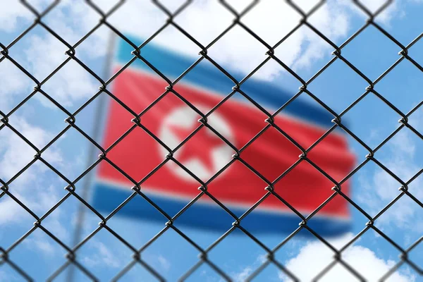 Mavi gökyüzünün arka planında çelik bir ağ ve Kuzey Kore bayrağıyla bir bayrak direği.