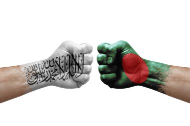 Two hands punch to each others on white background. Country flags painted fists, conflict crisis concept between afghanistan and bangladesh