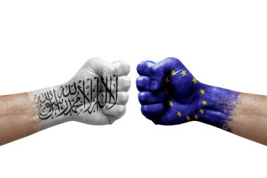 Two hands punch to each others on white background. Country flags painted fists, conflict crisis concept between afghanistan and european union