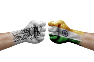 Two hands punch to each others on white background. Country flags painted fists, conflict crisis concept between afghanistan and india