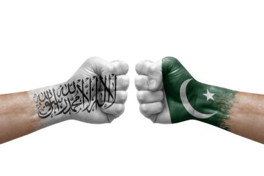 Two hands punch to each others on white background. Country flags painted fists, conflict crisis concept between afghanistan and pakistan