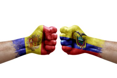 Two hands punch to each others on white background. Country flags painted fists, conflict crisis concept between andorra and ecuador