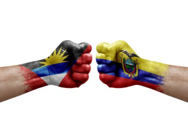 Two hands punch to each others on white background. Country flags painted fists, conflict crisis concept between antigua and barbuda and ecuador