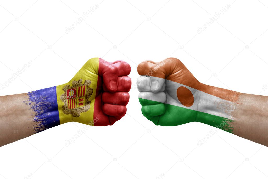 Two hands punch to each others on white background. Country flags painted fists, conflict crisis concept between andorra and niger
