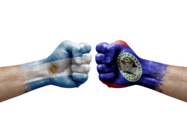 Two hands punch to each others on white background. Country flags painted fists, conflict crisis concept between argentina and belize