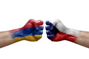 Two hands punch to each others on white background. Country flags painted fists, conflict crisis concept between armenia and czechia