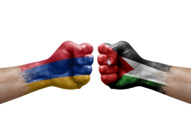 Two hands punch to each others on white background. Country flags painted fists, conflict crisis concept between armenia and jordan