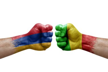 Two hands punch to each others on white background. Country flags painted fists, conflict crisis concept between armenia and mali