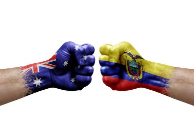 Two hands punch to each others on white background. Country flags painted fists, conflict crisis concept between australia and ecuador