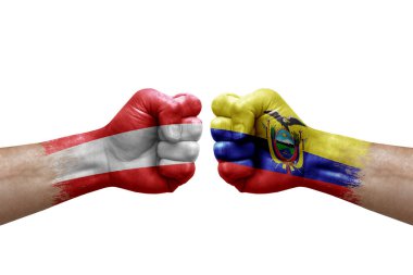 Two hands punch to each others on white background. Country flags painted fists, conflict crisis concept between austria and ecuador