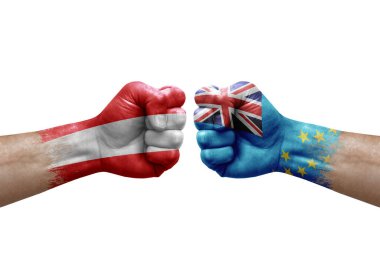 Two hands punch to each others on white background. Country flags painted fists, conflict crisis concept between austria and tuvalu