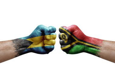 Two hands punch to each others on white background. Country flags painted fists, conflict crisis concept between bahamas and vanuatu