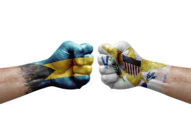 Two hands punch to each others on white background. Country flags painted fists, conflict crisis concept between bahamas and virgin islands