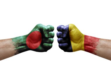 Two hands punch to each others on white background. Country flags painted fists, conflict crisis concept between bangladesh and chad