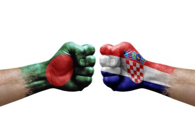 Two hands punch to each others on white background. Country flags painted fists, conflict crisis concept between bangladesh and croatia