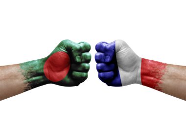 Two hands punch to each others on white background. Country flags painted fists, conflict crisis concept between bangladesh and france
