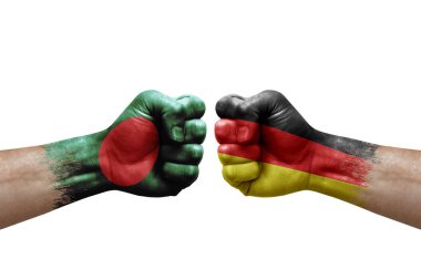 Two hands punch to each others on white background. Country flags painted fists, conflict crisis concept between bangladesh and germany