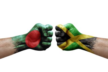 Two hands punch to each others on white background. Country flags painted fists, conflict crisis concept between bangladesh and jamaica