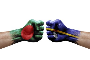 Two hands punch to each others on white background. Country flags painted fists, conflict crisis concept between bangladesh and nauru