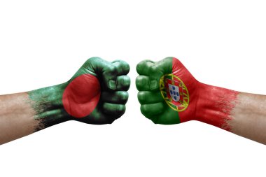 Two hands punch to each others on white background. Country flags painted fists, conflict crisis concept between bangladesh and portugal