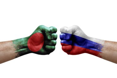 Two hands punch to each others on white background. Country flags painted fists, conflict crisis concept between bangladesh and russia