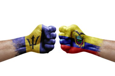 Two hands punch to each others on white background. Country flags painted fists, conflict crisis concept between barbados and ecuador