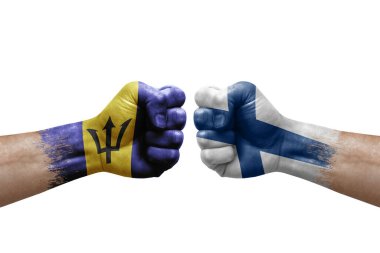 Two hands punch to each others on white background. Country flags painted fists, conflict crisis concept between barbados and finland