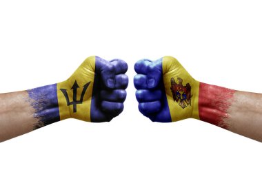 Two hands punch to each others on white background. Country flags painted fists, conflict crisis concept between barbados and moldova