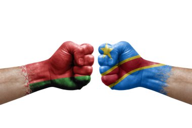 Two hands punch to each others on white background. Country flags painted fists, conflict crisis concept between belarus and dr congo