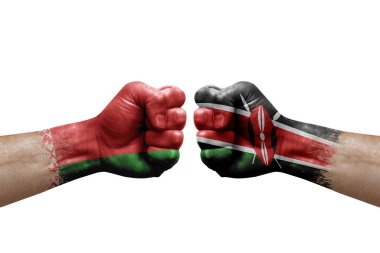 Two hands punch to each others on white background. Country flags painted fists, conflict crisis concept between belarus and kenya