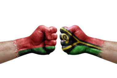 Two hands punch to each others on white background. Country flags painted fists, conflict crisis concept between belarus and vanuatu
