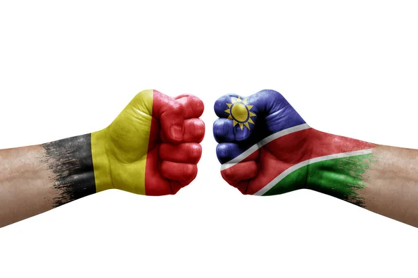 Two Hands Punch Each Others White Background Country Flags Painted — Stok fotoğraf