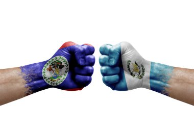 Two hands punch to each others on white background. Country flags painted fists, conflict crisis concept between belize and guatemala