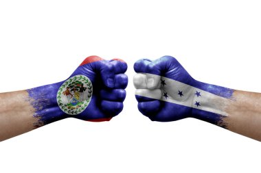 Two hands punch to each others on white background. Country flags painted fists, conflict crisis concept between belize and honduras