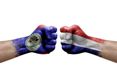 Two hands punch to each others on white background. Country flags painted fists, conflict crisis concept between belize and netherlands