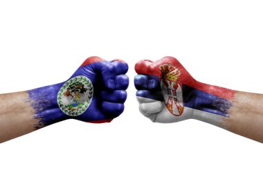 Two hands punch to each others on white background. Country flags painted fists, conflict crisis concept between belize and serbia