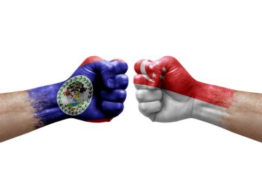 Two hands punch to each others on white background. Country flags painted fists, conflict crisis concept between belize and singapore