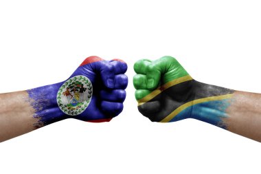 Two hands punch to each others on white background. Country flags painted fists, conflict crisis concept between belize and tanzania