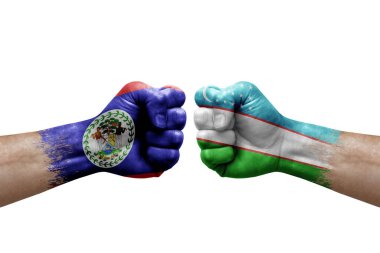 Two hands punch to each others on white background. Country flags painted fists, conflict crisis concept between belize and uzbekistan