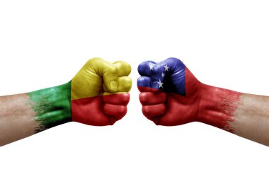 Two hands punch to each others on white background. Country flags painted fists, conflict crisis concept between benin and samoa
