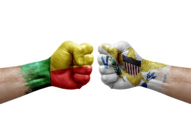 Two hands punch to each others on white background. Country flags painted fists, conflict crisis concept between benin and virgin islands