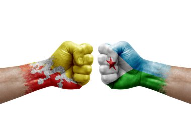 Two hands punch to each others on white background. Country flags painted fists, conflict crisis concept between bhutan and djibouti