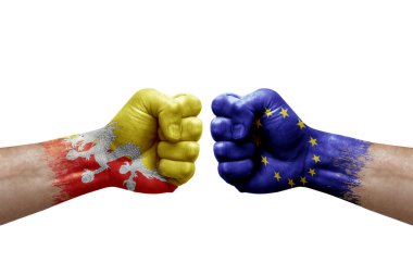 Two hands punch to each others on white background. Country flags painted fists, conflict crisis concept between bhutan and european union