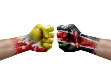 Two hands punch to each others on white background. Country flags painted fists, conflict crisis concept between bhutan and kenya