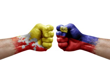 Two hands punch to each others on white background. Country flags painted fists, conflict crisis concept between bhutan and liechtenstein