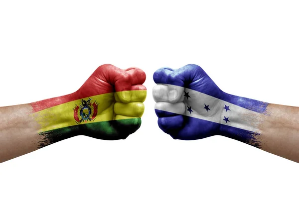 Two Hands Punch Each Others White Background Country Flags Painted — Stock Fotó